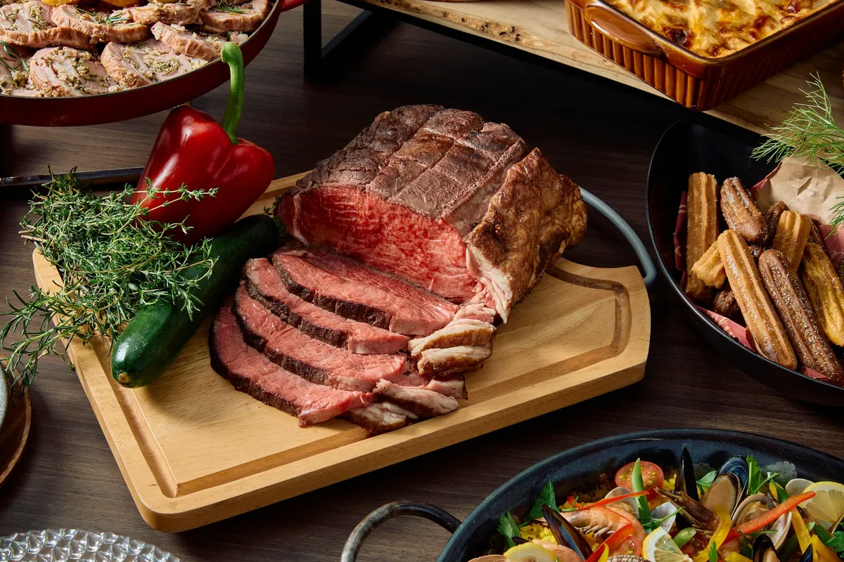Roasted beef served with fresh herbs