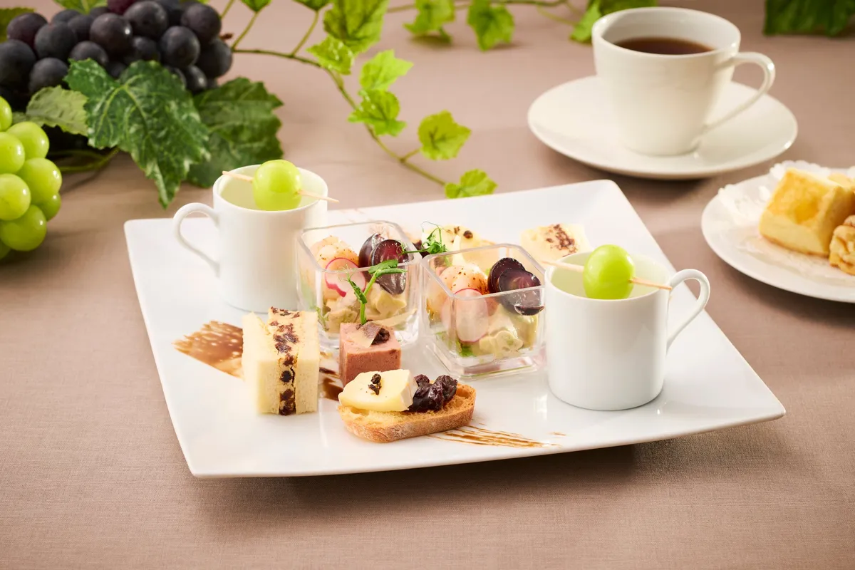 Savory dishes including pâté and chilled soup