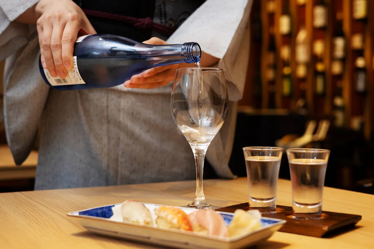 Sake being poured into a glass