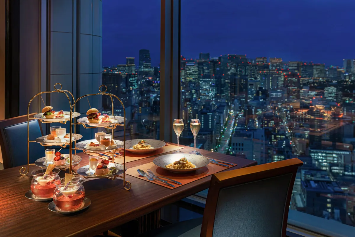 Dining table at Artist Cafe overlooking the Tokyo nightscape
