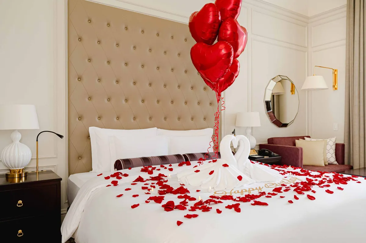 Birthday rose decoration with heart balloons and swan art