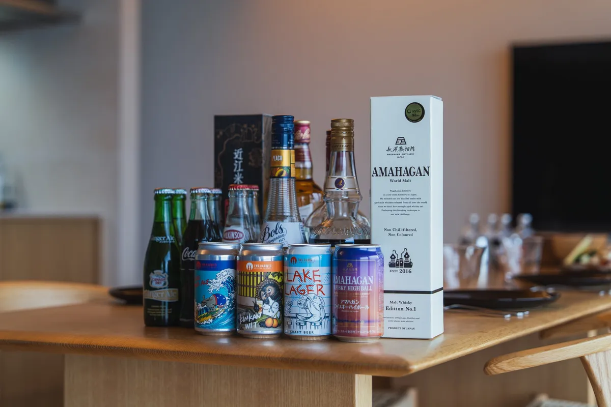 Bottles and cans of local craft beer and whisky on a table