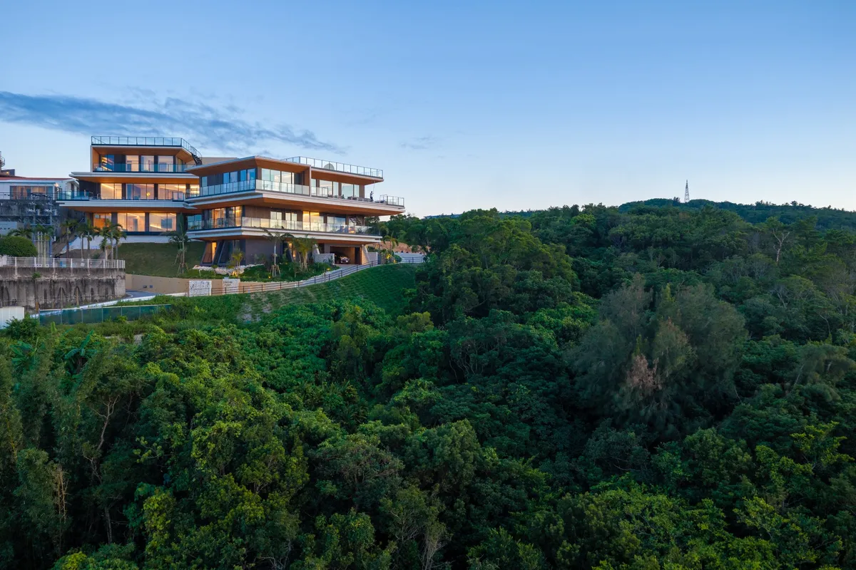 Aerial view of the resort nestled in greenery.