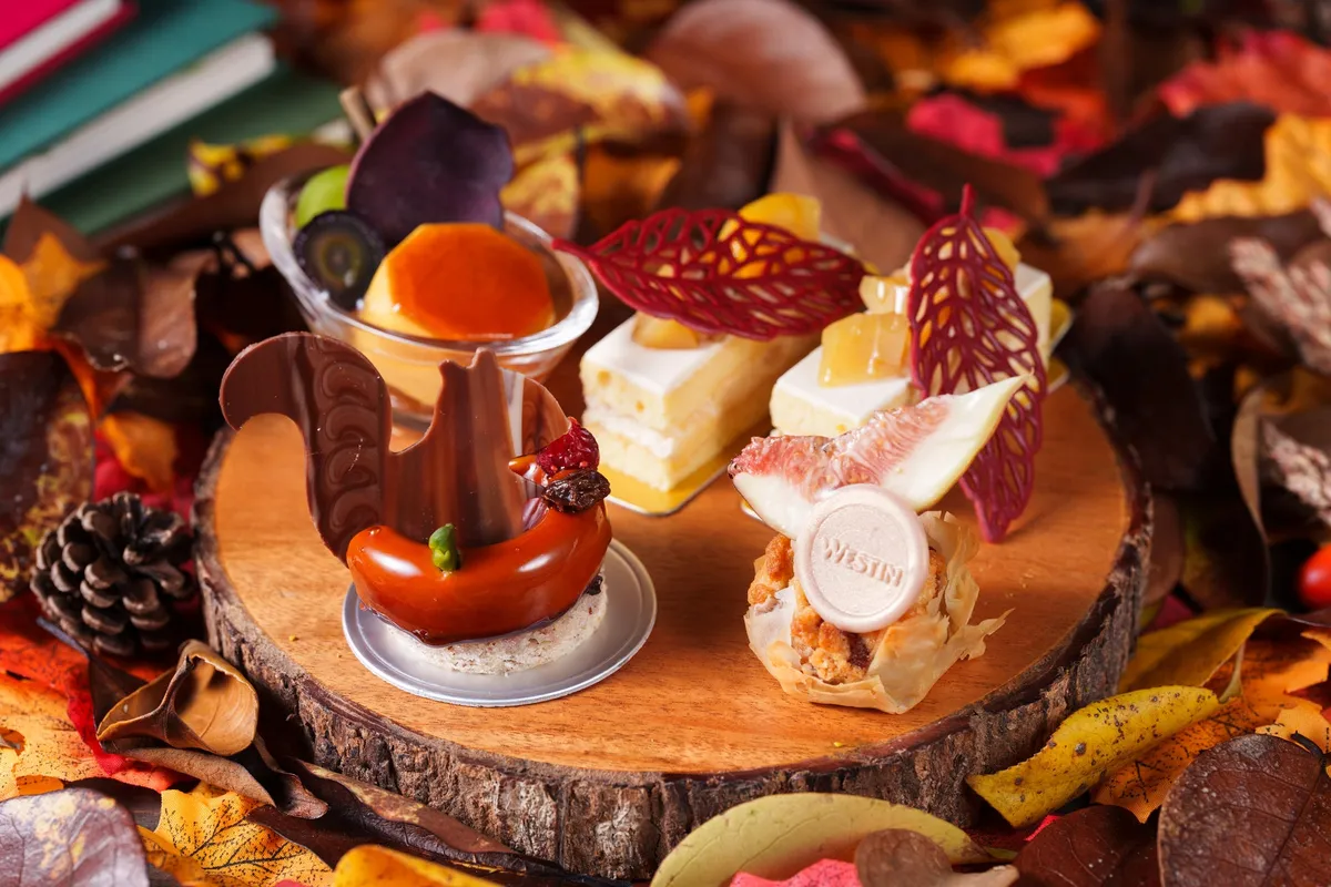 Sweets selection with a chocolate squirrel and fig tart